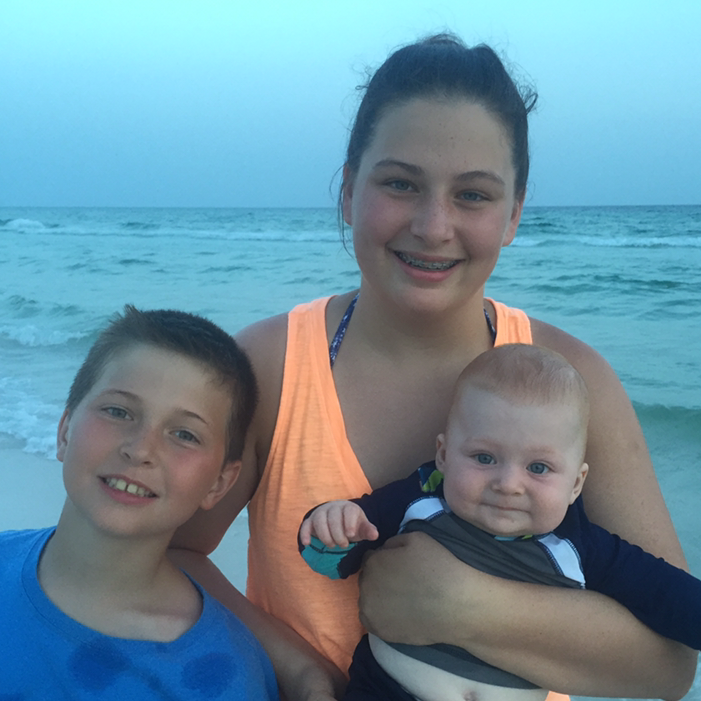 siblings at beach